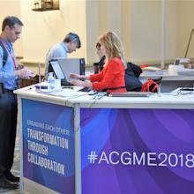 Andrea Rio hard at work at the Information Booth at this spring's Annual Educational Conference in Orlando, Florida