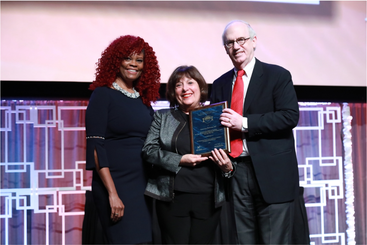 ACGME Board Chair Dr. Jeffrey P. Gold and ACGME Awards Liaison DeLonda Dowling presented Dr. Bernstein with the Gienapp Award at the 2019 ACGME Annual Educational Conference